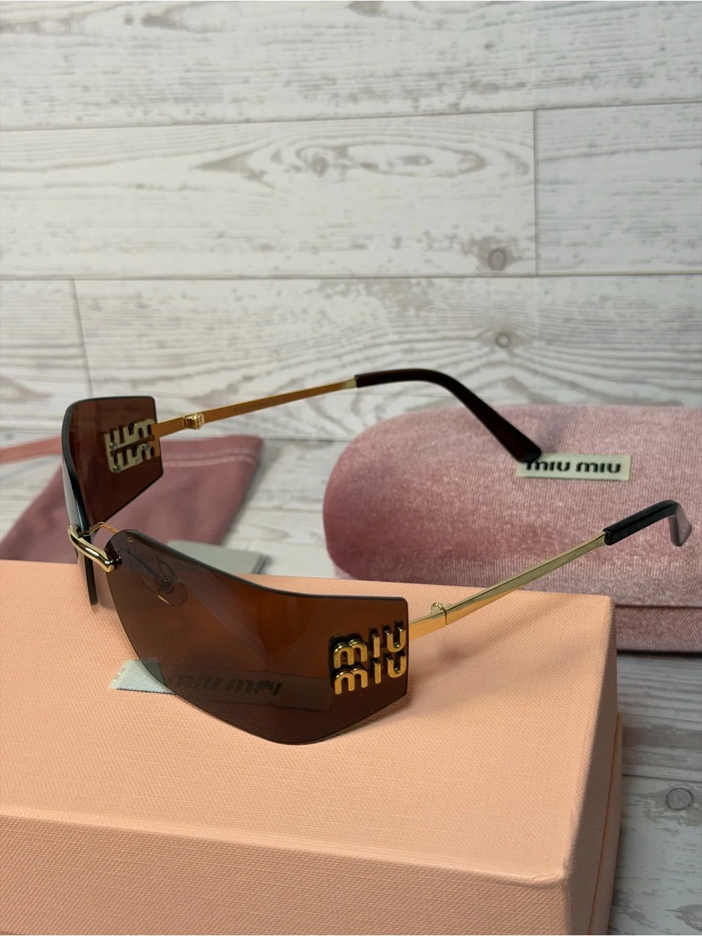 Miu Miu Brown Oversized Shield Sunglasses with Gold Accents